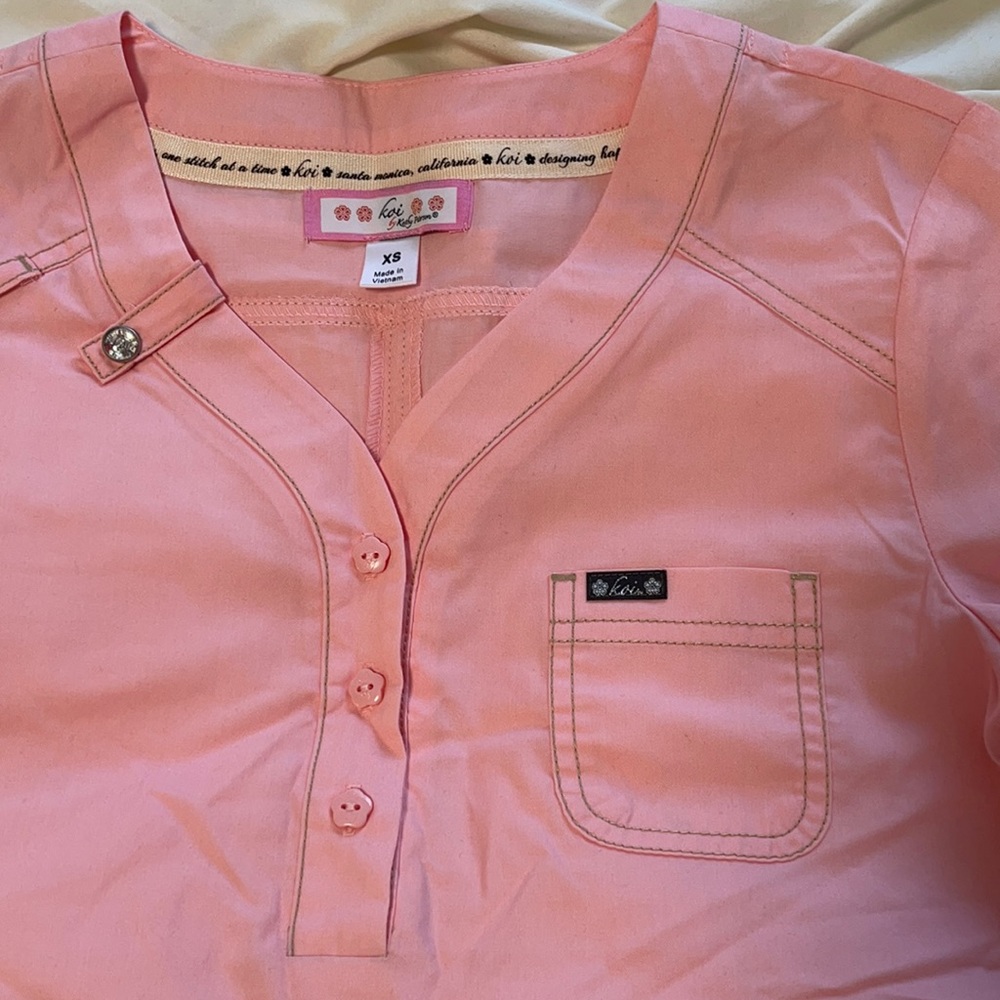 Scrub top, brand new with tags. Only tried on!